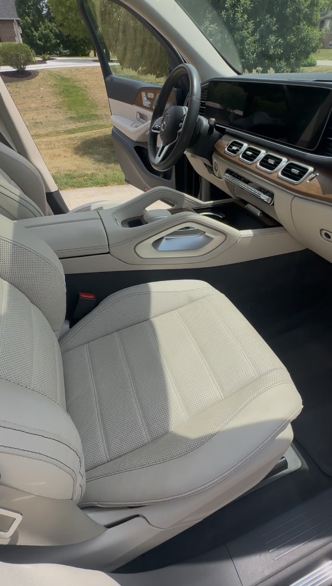 Mercedes interior after detailing, cream leather seats and a clean dashboard
